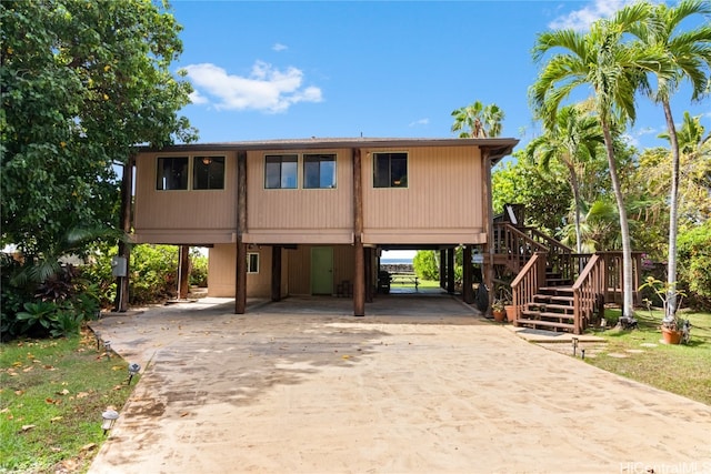 view of front of house featuring a carport