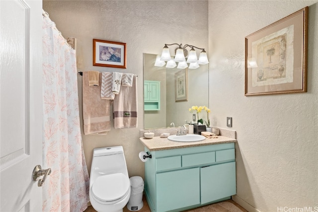 bathroom with vanity, toilet, and a shower with curtain