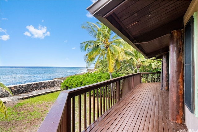 deck with a water view and a beach view