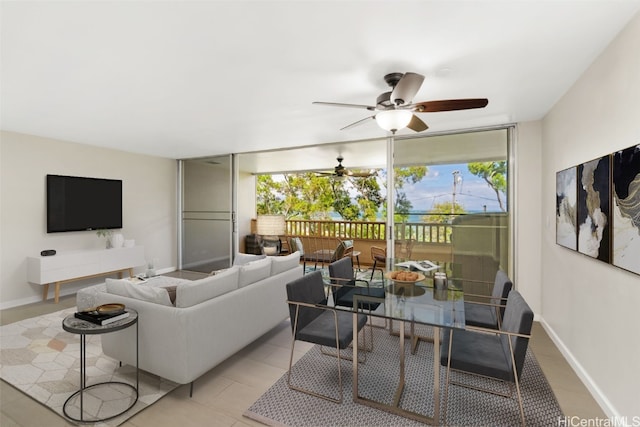 tiled living room with ceiling fan