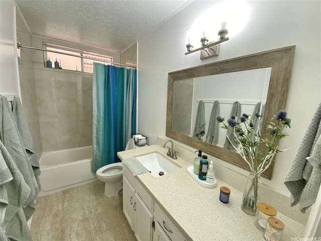 bathroom with toilet, shower / bath combo with shower curtain, a textured ceiling, and vanity