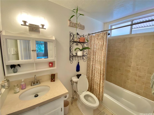 bathroom with tile patterned floors, vanity, shower / bath combination with curtain, and toilet