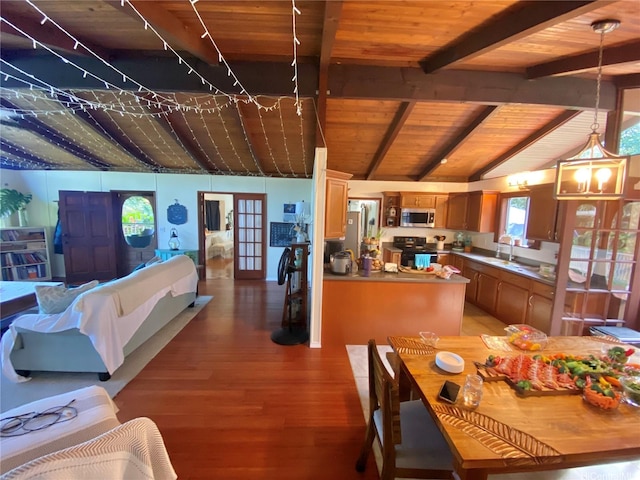 dining space with wooden ceiling and light wood-style flooring