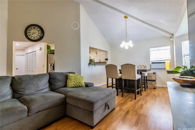 95-1058G Ainamakua Dr Unit 119, Mililani, HI 96789 - living room featuring high vaulted ceiling, light wood finished floors, cooling unit, a chandelier, and baseboards