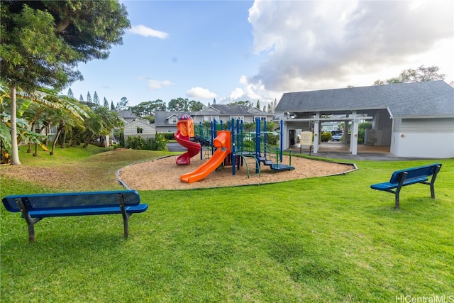 view of jungle gym featuring a lawn