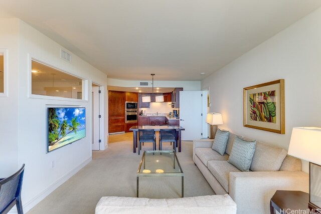 living room with light carpet