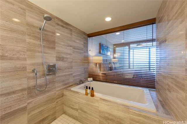 bathroom with independent shower and bath and tile walls