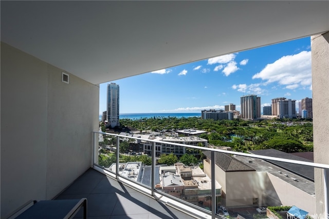 balcony featuring a water view