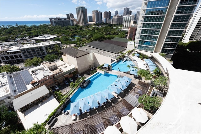 birds eye view of property with a water view