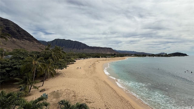 property view of water with a mountain view and a beach view