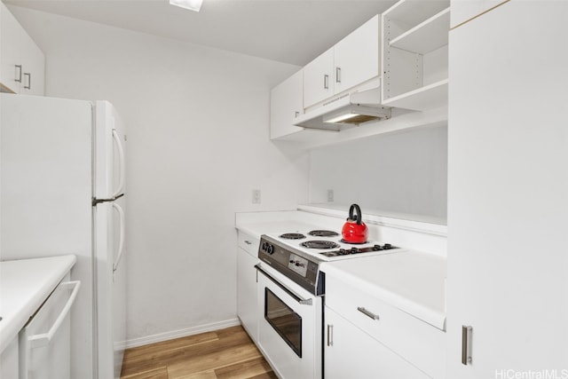 kitchen with white cabinets, light wood-type flooring, and white appliances