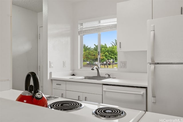 bathroom featuring vanity and a textured ceiling