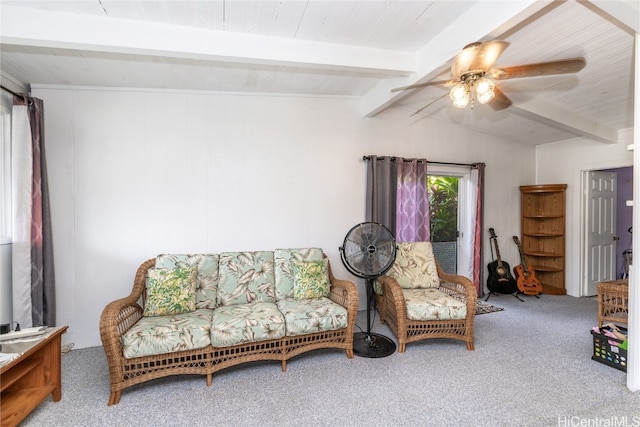 living room featuring lofted ceiling with beams, carpet, and ceiling fan