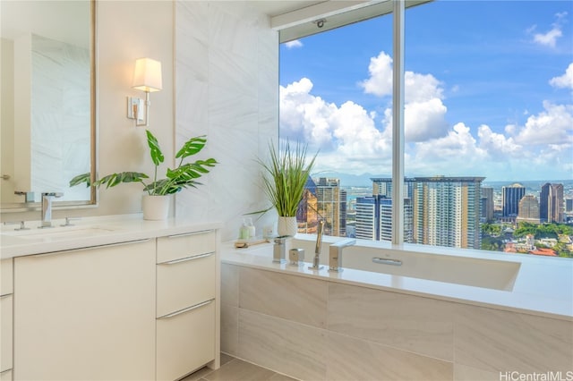 bathroom with vanity and tile patterned flooring