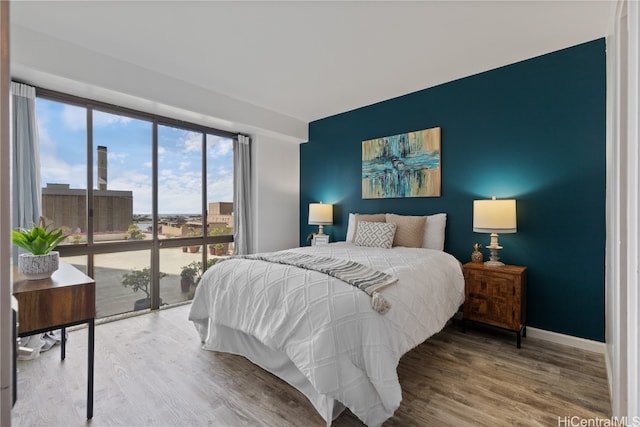 bedroom featuring wood-type flooring