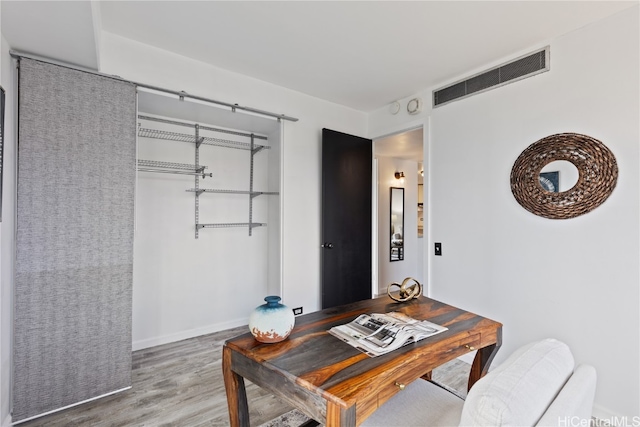 office area featuring hardwood / wood-style floors