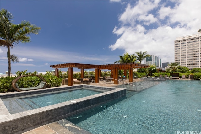 view of swimming pool with a pergola