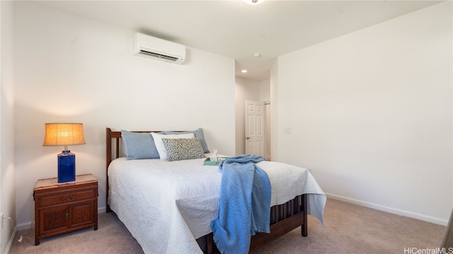 carpeted bedroom featuring a wall unit AC