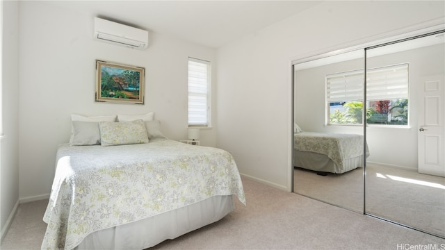 carpeted bedroom featuring a wall mounted AC, multiple windows, and a closet