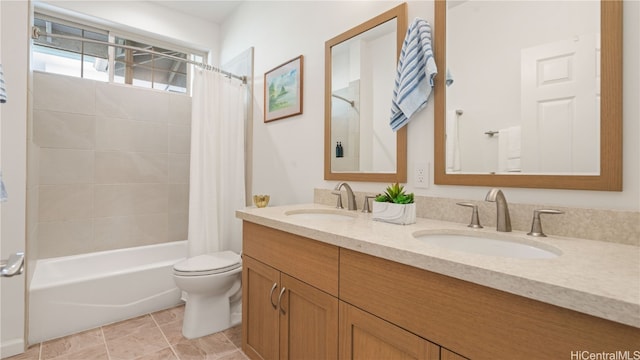 full bathroom featuring vanity, shower / bath combination with curtain, and toilet