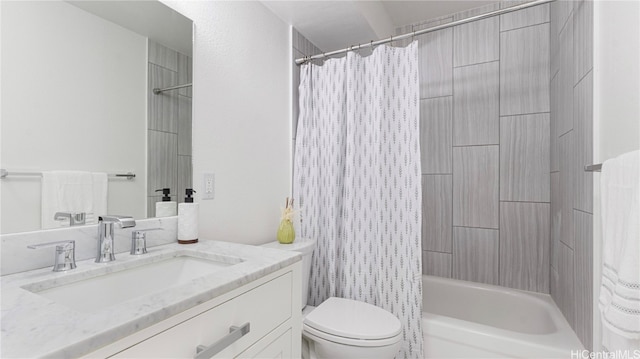 full bathroom with vanity, toilet, and shower / bath combo