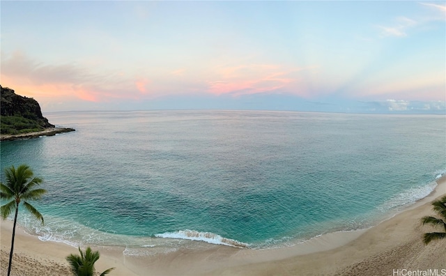 view of water feature with a beach view