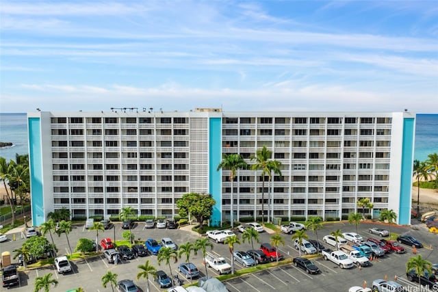 view of building exterior with a water view