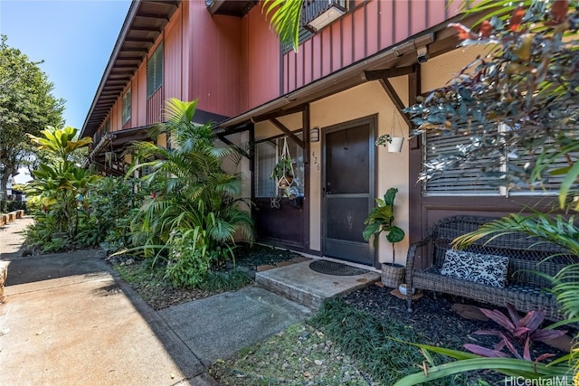 property entrance with a balcony