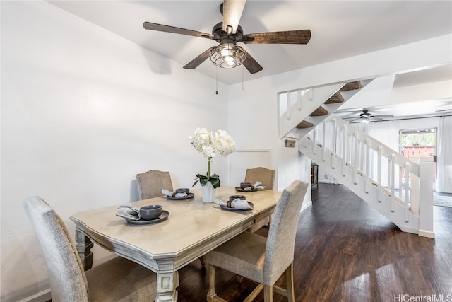 dining area with dark hardwood / wood-style floors