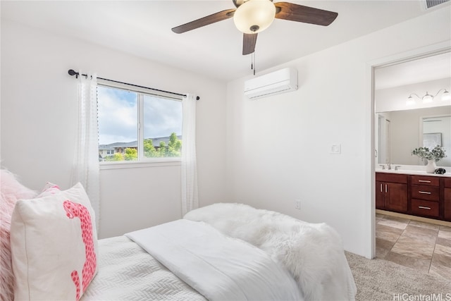 bedroom with a wall mounted AC, ceiling fan, and connected bathroom