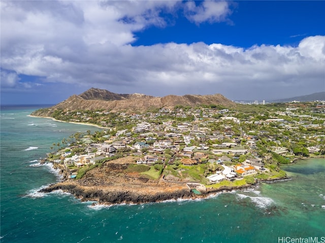 drone / aerial view with a water and mountain view