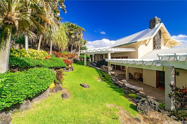 view of yard featuring a pergola and a patio area