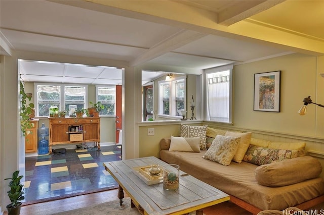 living room with beam ceiling