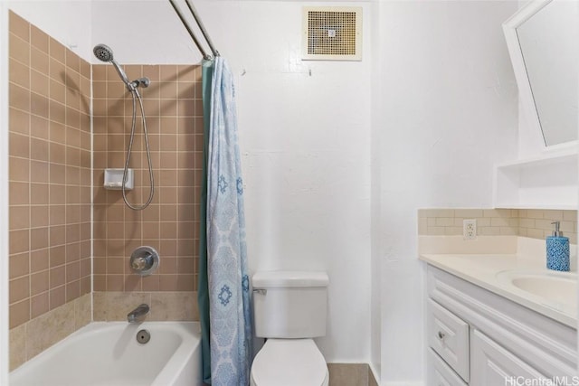 full bathroom with decorative backsplash, shower / bath combination with curtain, vanity, and toilet