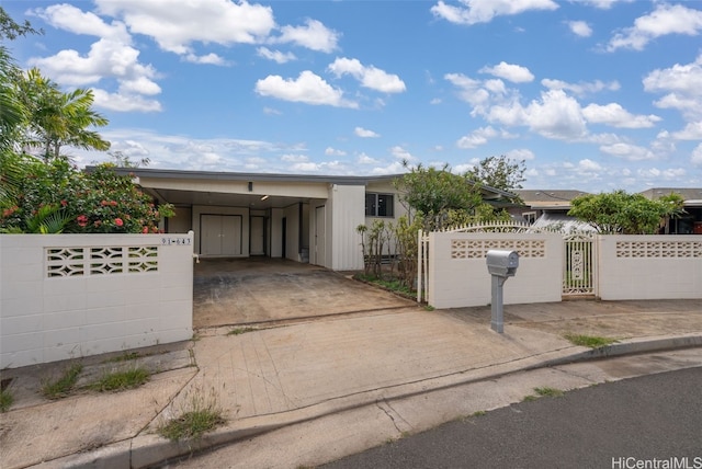 view of front facade with a carport