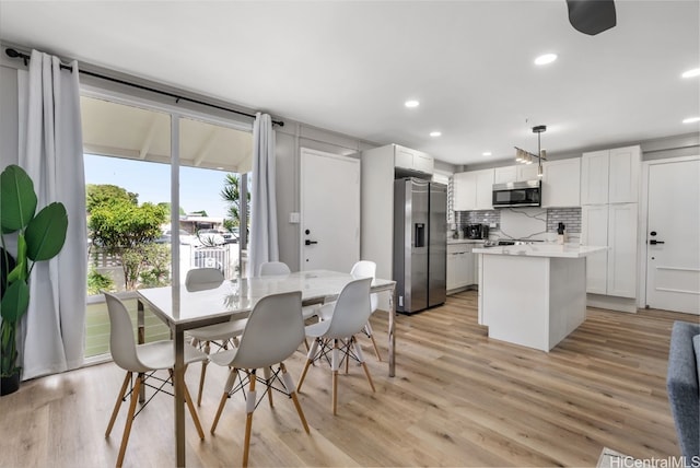 dining area featuring light hardwood / wood-style flooring