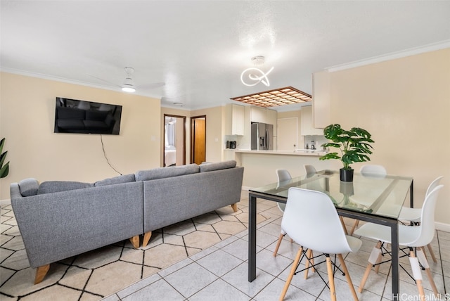 dining area featuring light tile patterned flooring and ornamental molding