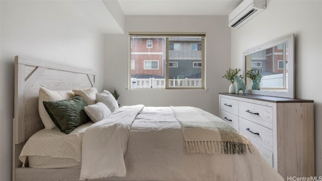 bedroom featuring a wall unit AC and multiple windows