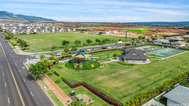 birds eye view of property with a mountain view