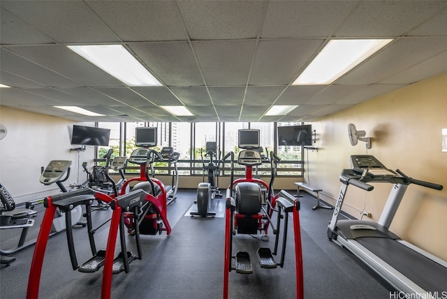 gym featuring a paneled ceiling