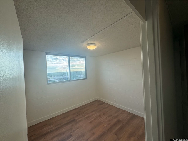 950 Lehua Ave Unit 801, Pearl City, HI 96782 - empty room with a textured ceiling and dark wood-style floors
