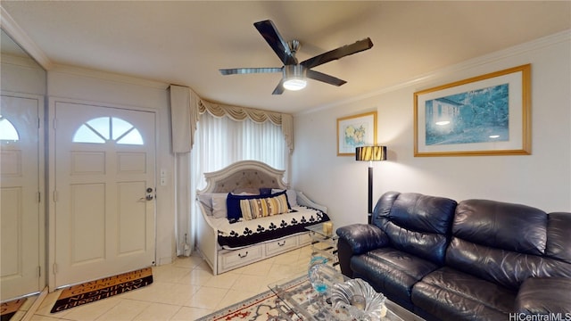 tiled living room with ceiling fan and ornamental molding