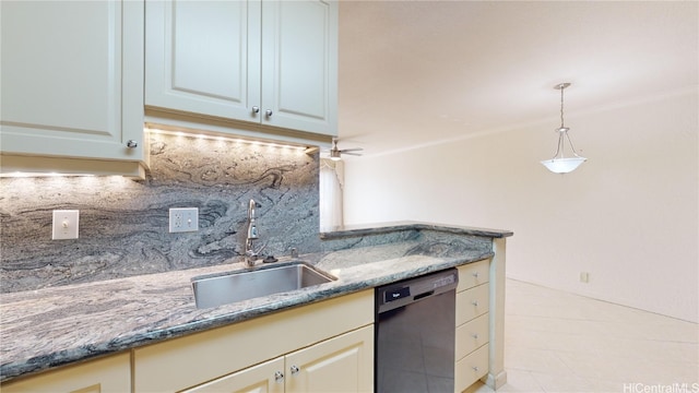 kitchen featuring black dishwasher, hanging light fixtures, decorative backsplash, sink, and dark stone counters