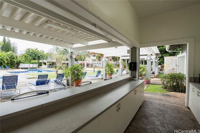 view of patio with a community pool