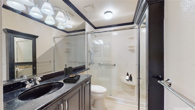 full bath featuring a stall shower, visible vents, tile patterned flooring, crown molding, and vanity