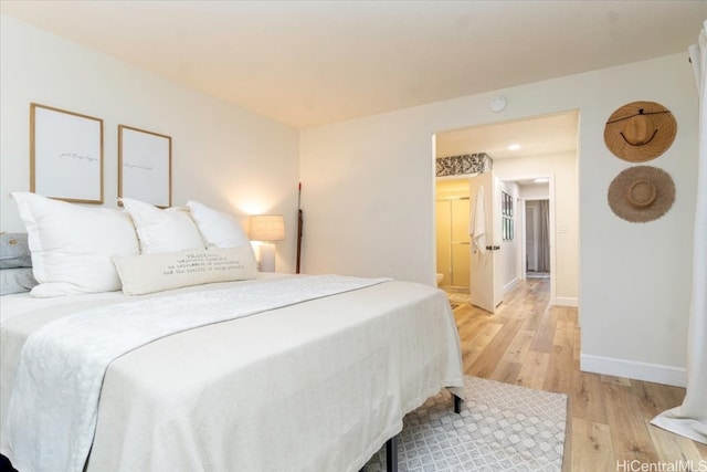 bedroom featuring light wood-type flooring