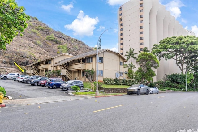 view of building exterior featuring a mountain view