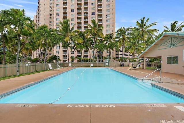 view of swimming pool featuring a patio area