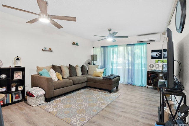 1080 Ala Napunani St Unit 403, Honolulu, HI 96818 - living area featuring a wall mounted AC, a ceiling fan, and light wood-style flooring