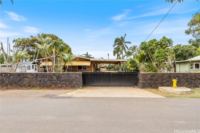 view of front of home with a carport